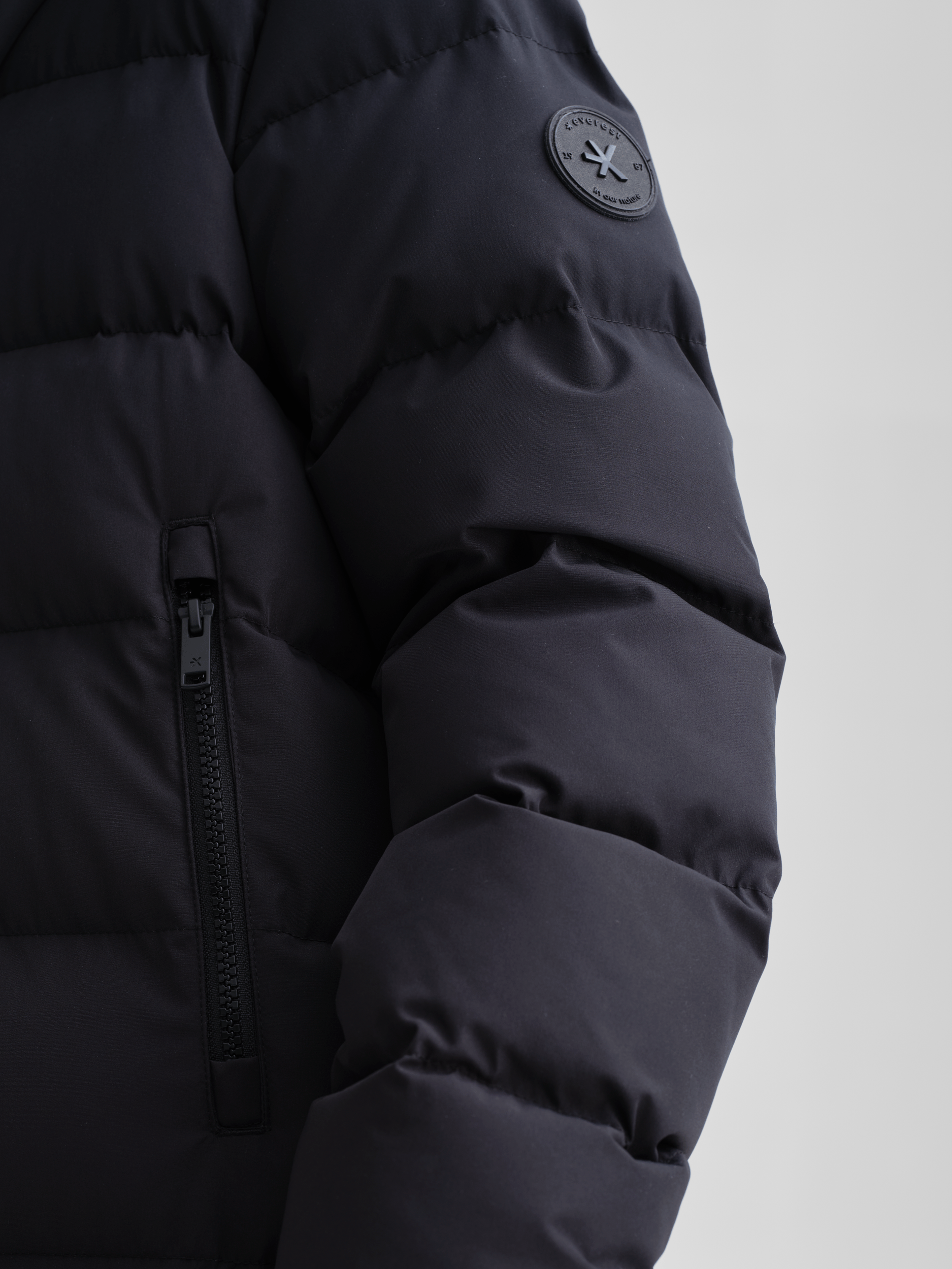 JUNEAU MANTEL SCHWARZ JUNIOR Everest Gepolsterter Mantel
